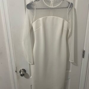 Calvin Klein Size 2 Illusion Sheath Dress. White Long Sleeve with Sheer Accents